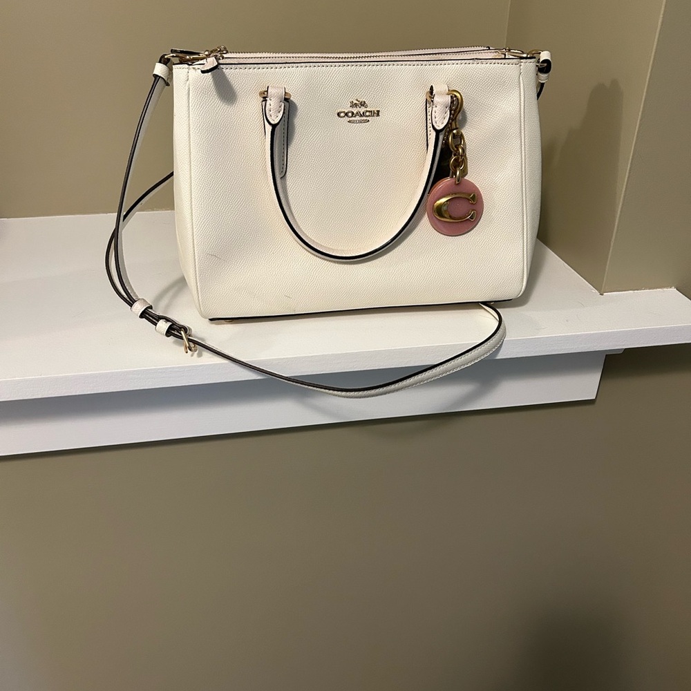 Bone colored Coach purse. Used only a couple times. 11.5 x 9.5 x 3.5